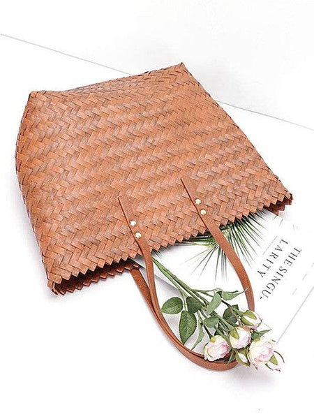 Babe Beachwear woven bamboo summer handbag with leather straps and decorative flowers