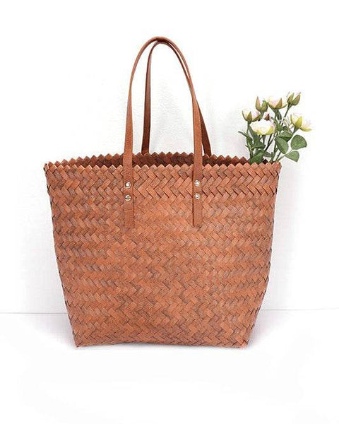 Babe Beachwear woven bamboo summer handbag with leather handles and woven texture
