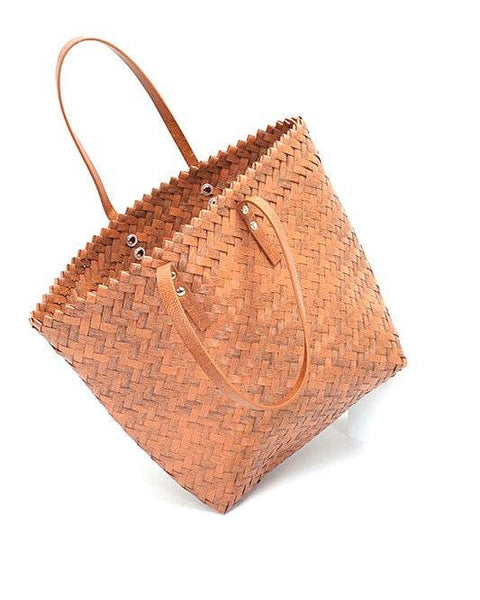 Babe Beachwear woven bamboo summer handbag with leather handles and spacious design
