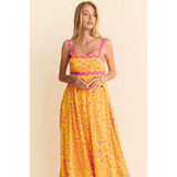 Trendsi yellow floral sundress for travel with pink trim and maxi dress design