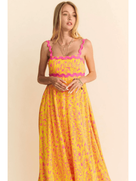 Trendsi yellow floral sundress for travel with pink trim and maxi dress design