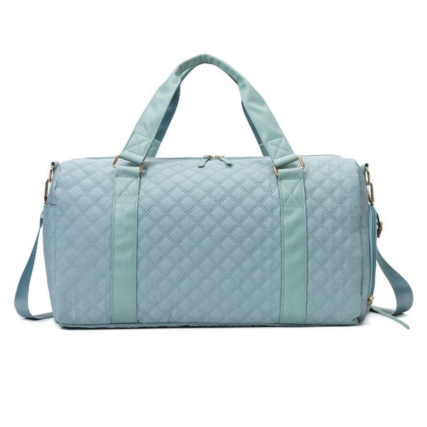 Babe Beachwear Zahra carry on overnight bag in light blue quilted fabric with handles and shoulder strap