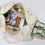 Babe Beachwaer Zahra carry on overnight bag in cream with shoes and travel essentials inside